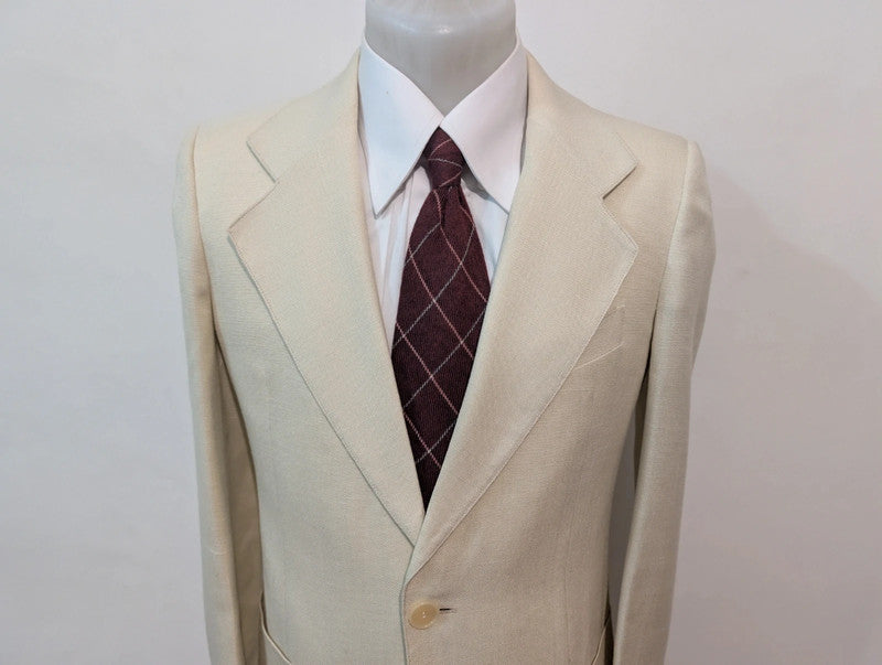 Merveilleux costume crème en laine