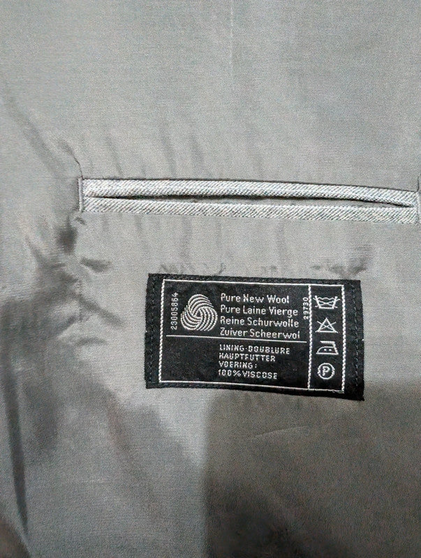 Légendaire costume gris en flanelle de laine