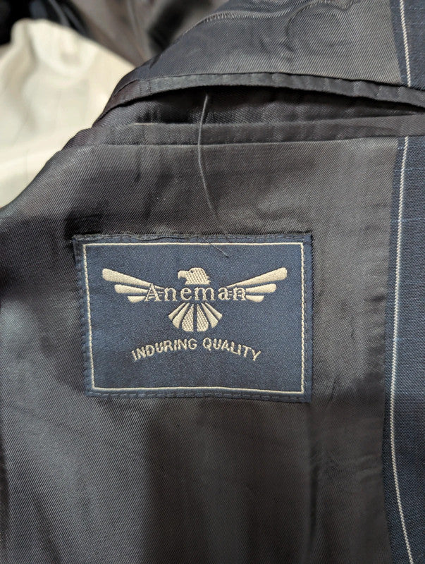 Exceptional pinstripe suit in cold wool