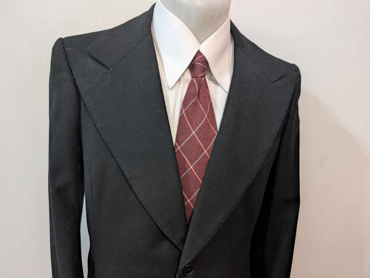 Sombre veste noire bespoke