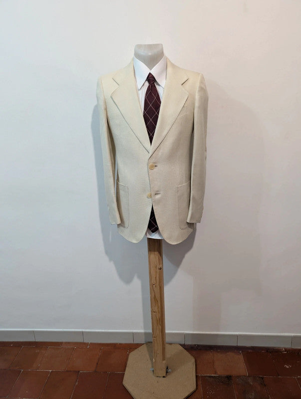 Merveilleux costume crème en laine