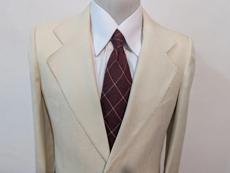 Merveilleux costume crème en laine