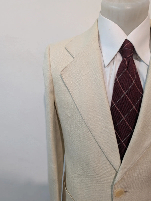 Merveilleux costume crème en laine