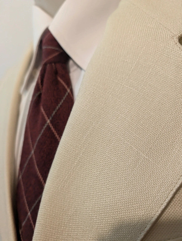 Merveilleux costume crème en laine