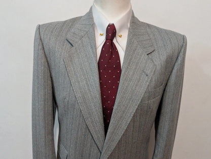 Légendaire costume gris en flanelle de laine