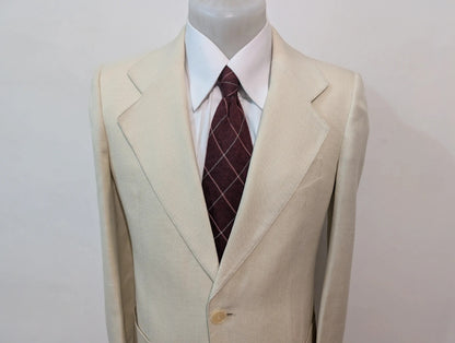Merveilleux costume crème en laine