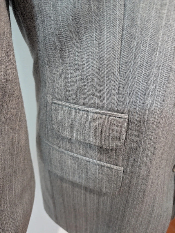 Légendaire costume gris en flanelle de laine