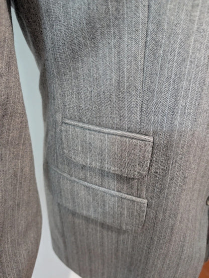 Légendaire costume gris en flanelle de laine
