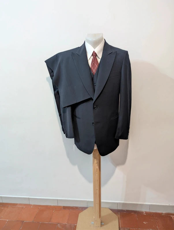 Exceptional navy blue three-piece wool suit