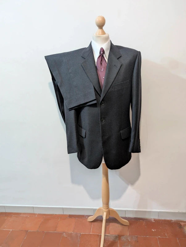 Heavy, evil, gray flannel suit