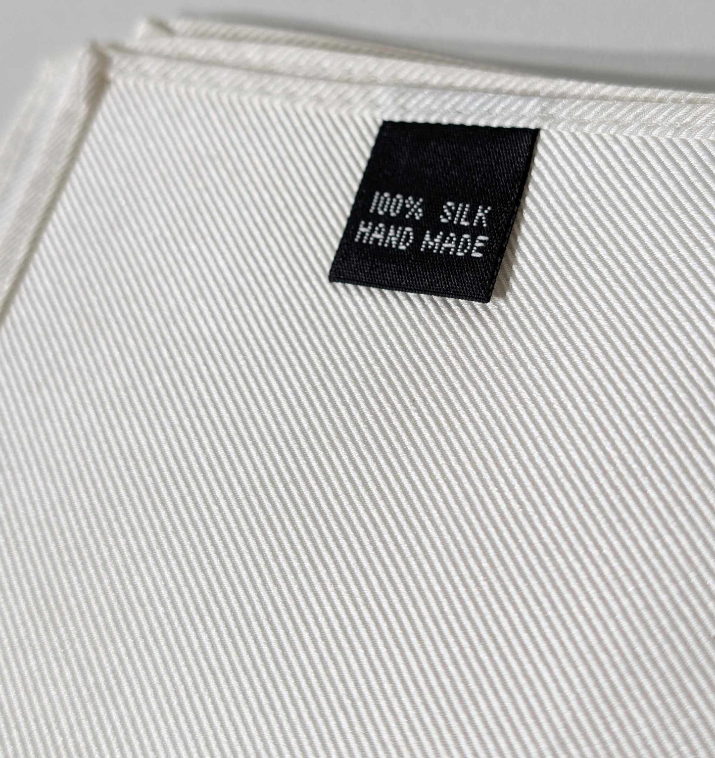 Pochette blanche en soie