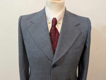 Gentille veste de couleur bleu à motif chevron en laine