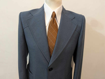 Magnifique costume bleu marine en laine