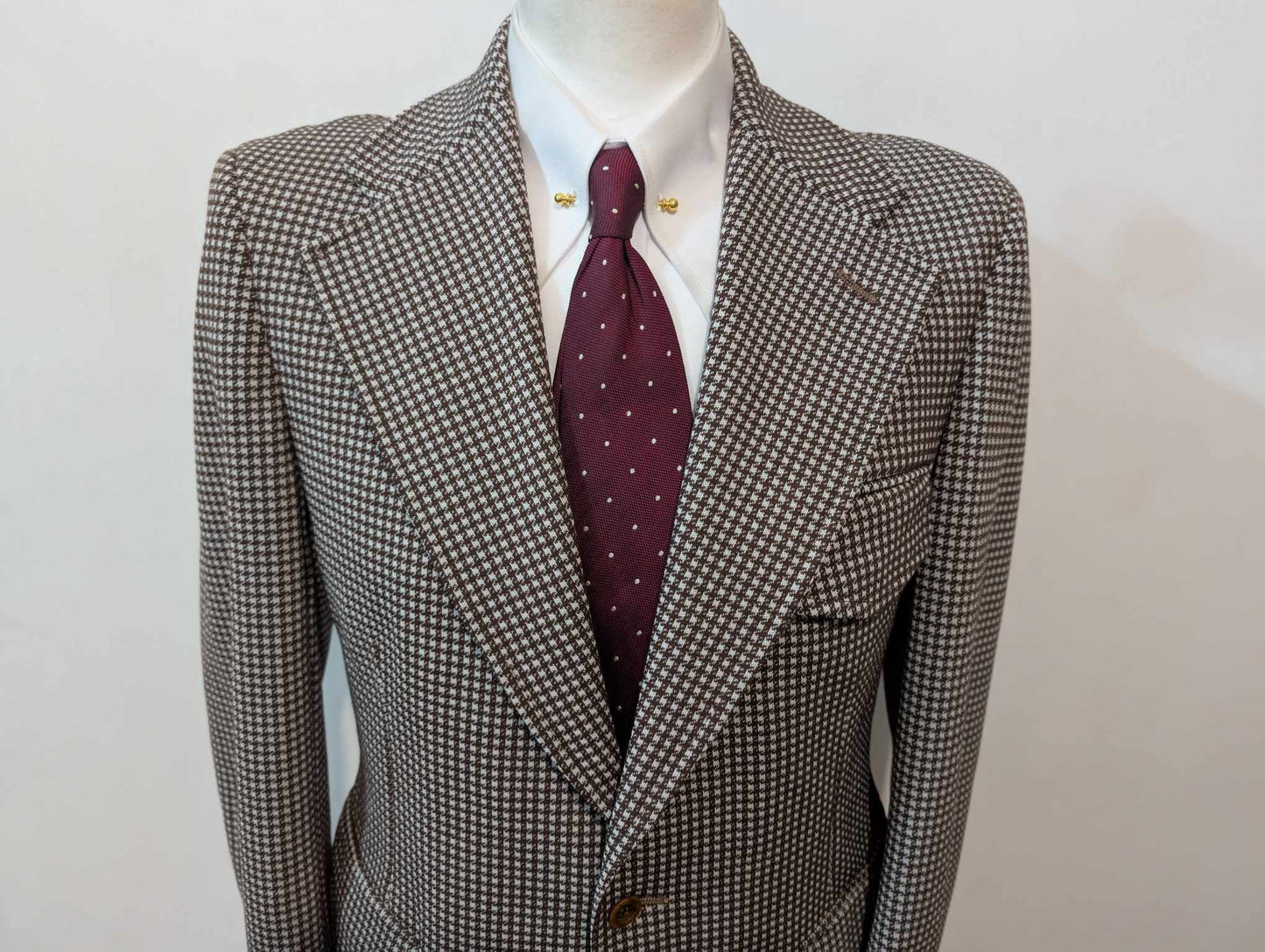 Excellente veste à motif pied de poule en laine