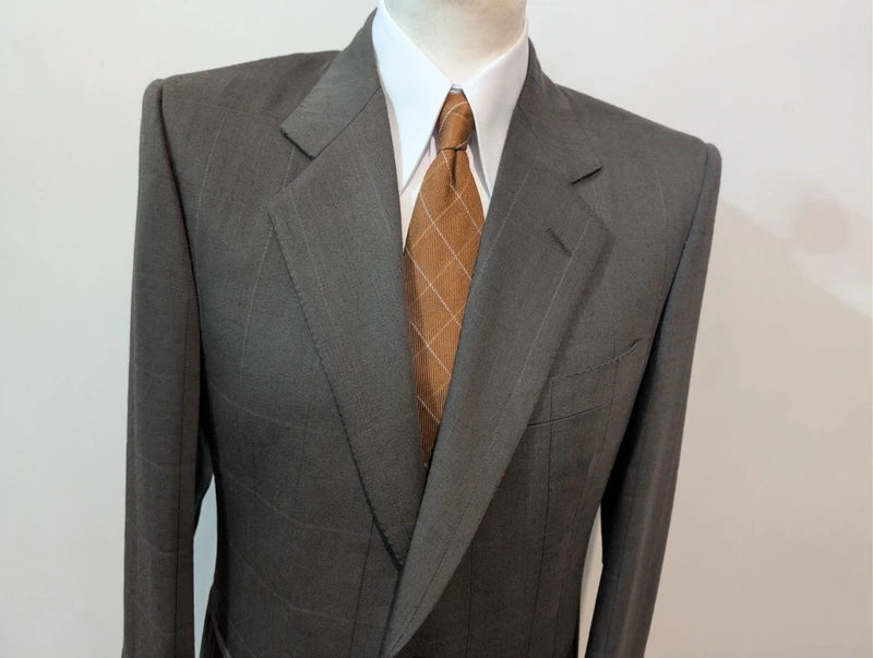 Elegante grüne karierte Wolljacke