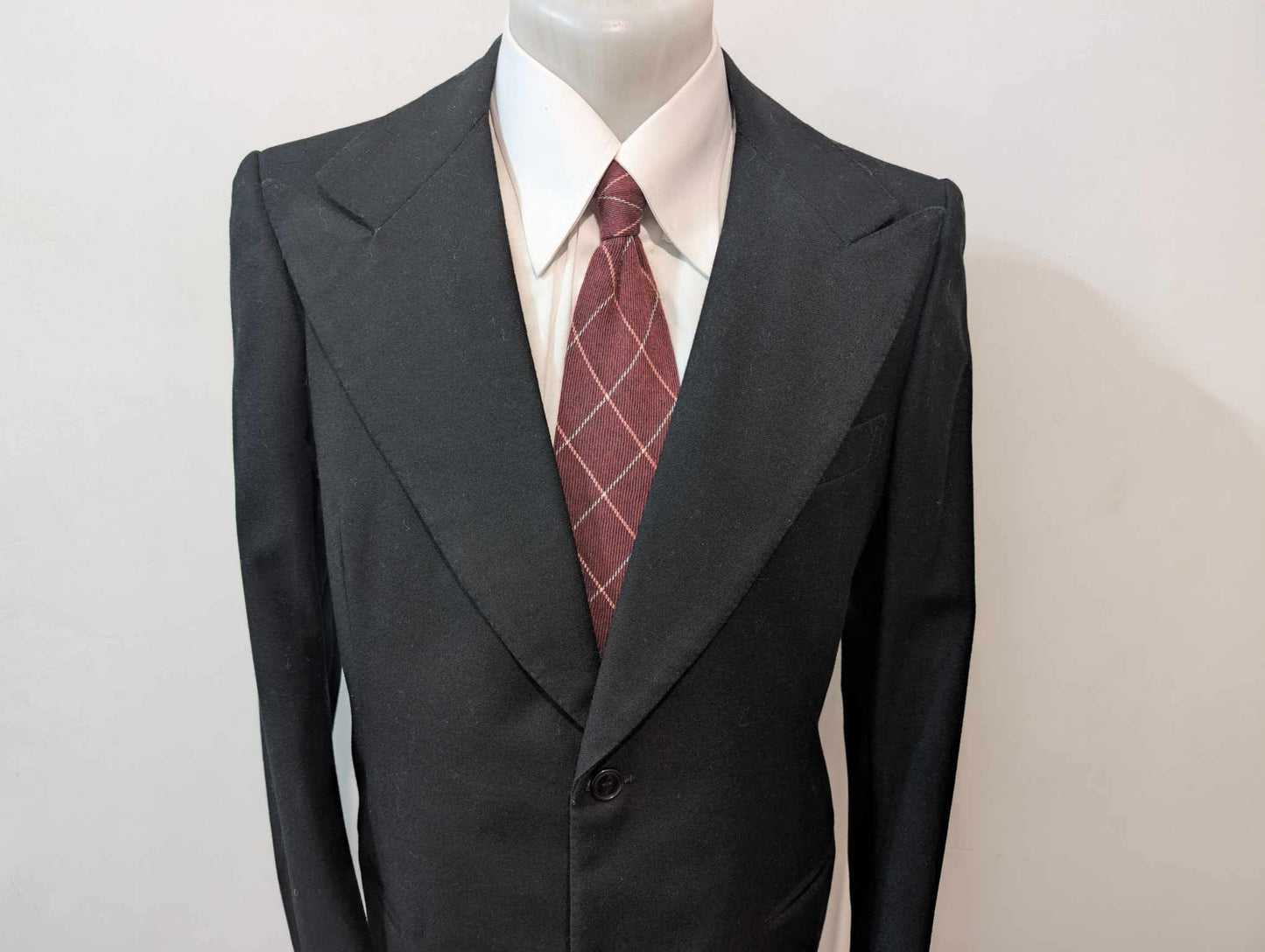 Sombre veste noire bespoke