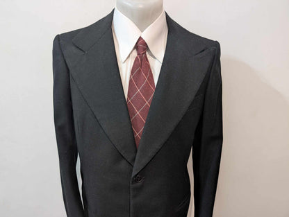 Sombre veste noire bespoke