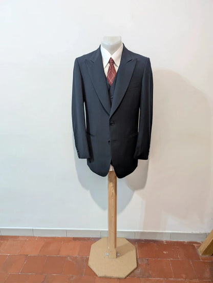 Exceptional navy blue three-piece wool suit