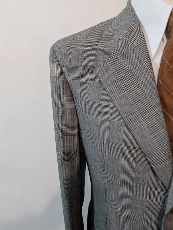 Eleganter grauer Prince-of-Wales-Anzug