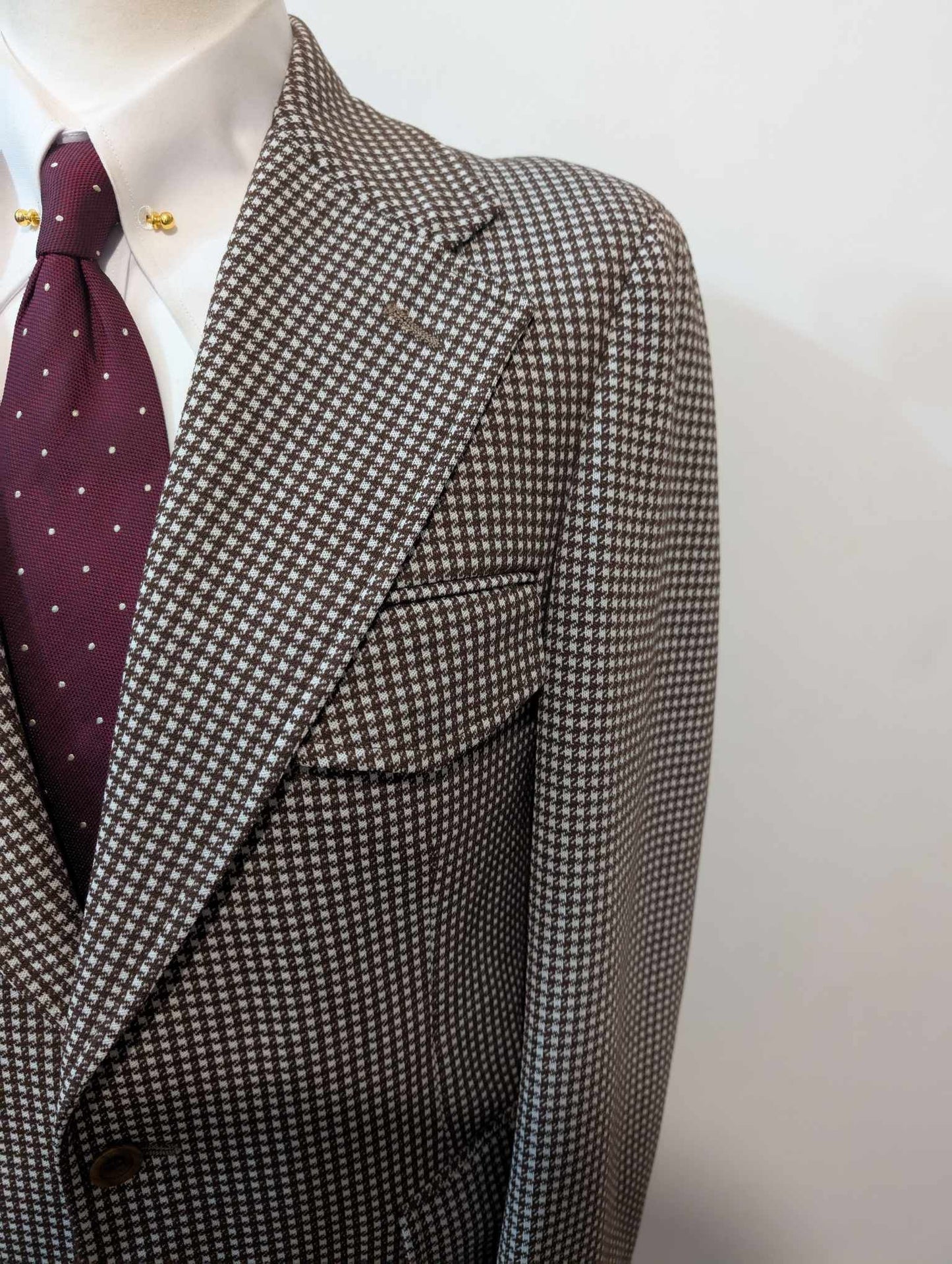 Excellente veste à motif pied de poule en laine