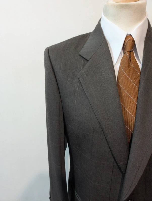 Elegante grüne karierte Wolljacke