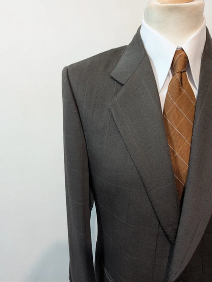 Elegante grüne karierte Wolljacke