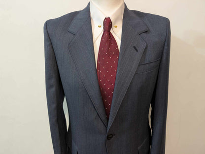 Gentil costume bleu marine à rayure en laine