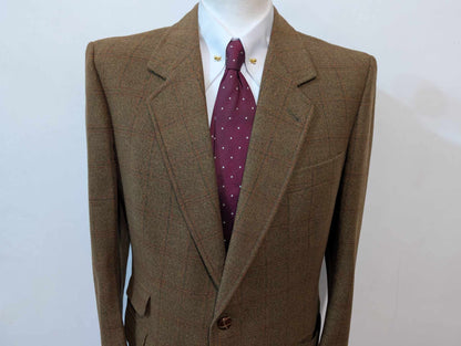 Mystérieux costume marron kaki en tweed