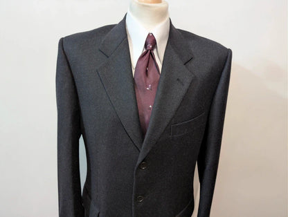 Heavy, evil, gray flannel suit