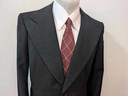Sombre veste noire bespoke