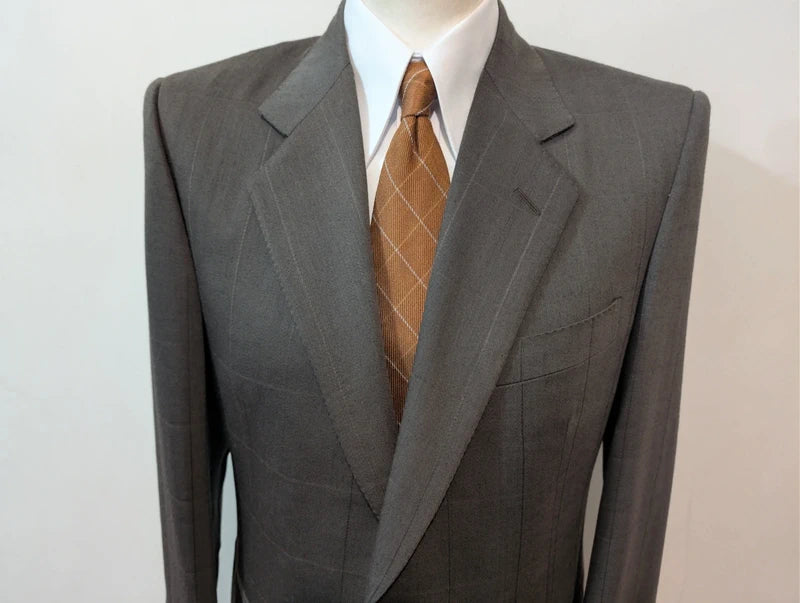 Elegante grüne karierte Wolljacke