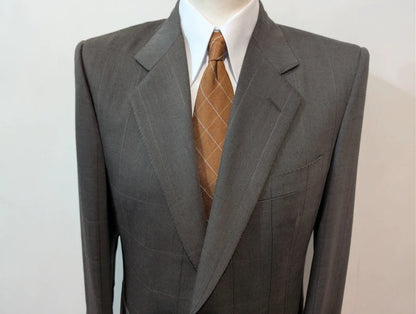 Elegante grüne karierte Wolljacke