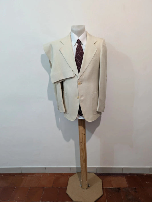 Merveilleux costume crème en laine