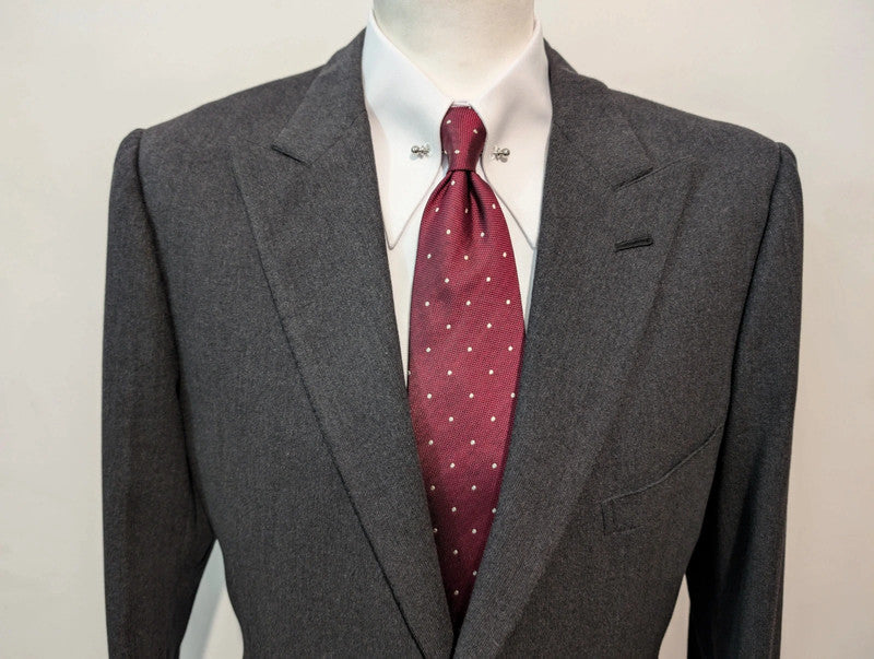 Old grey bespoke suit