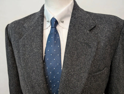 Épaisse veste gris à motif chevron en laine