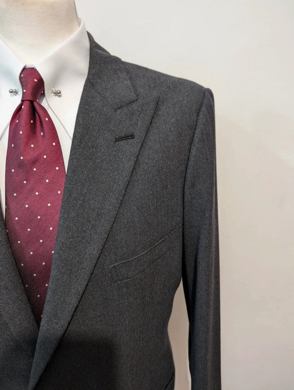 Old grey bespoke suit