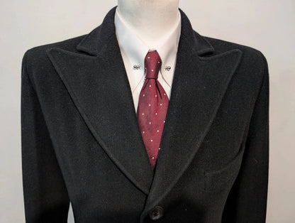 Sombre manteau noir en laine