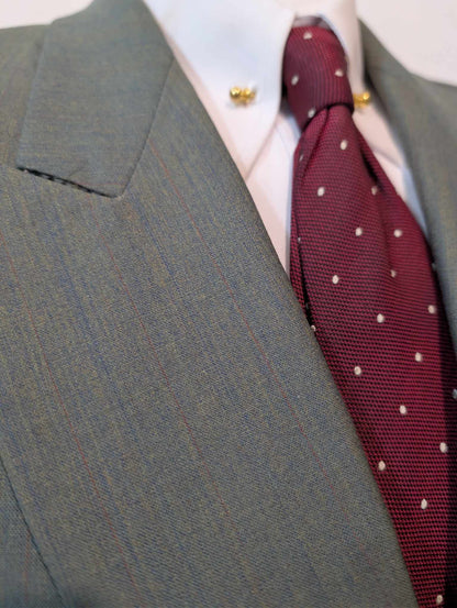 Magnifique costume croisé vert en laine