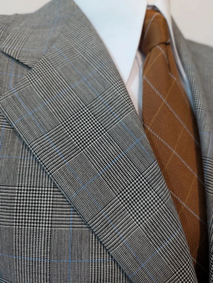 Eleganter grauer Prince-of-Wales-Anzug