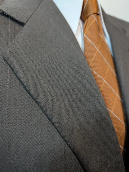 Elegante grüne karierte Wolljacke