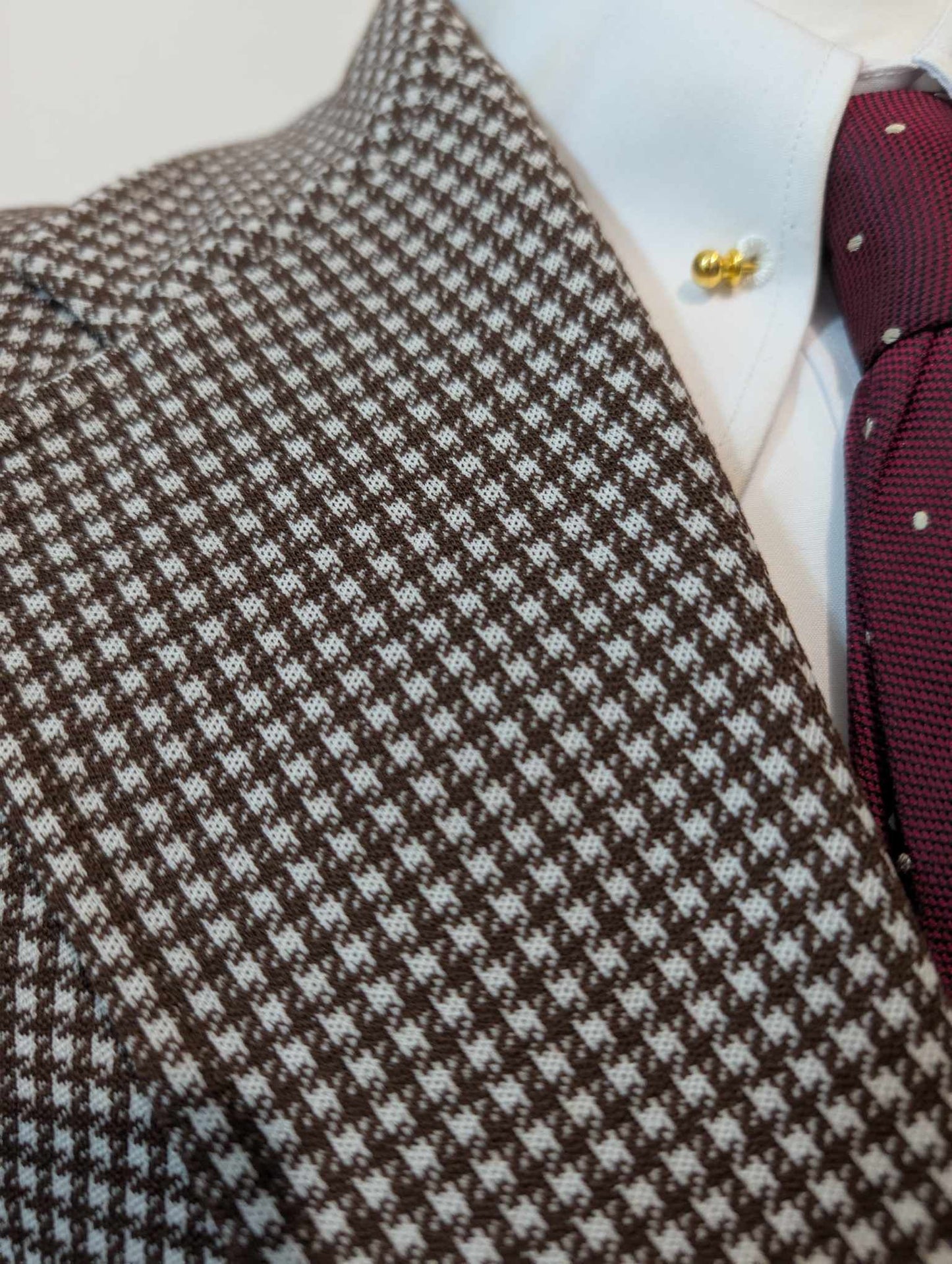Excellente veste à motif pied de poule en laine