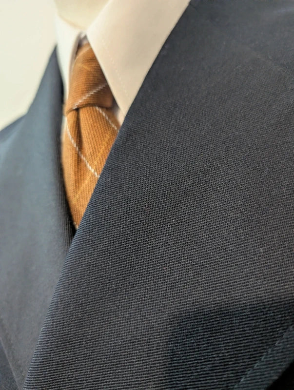 Eleganter marineblauer Wollmantel