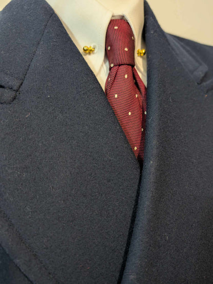 Étrange manteau croisé de couleur bleu marine en laine