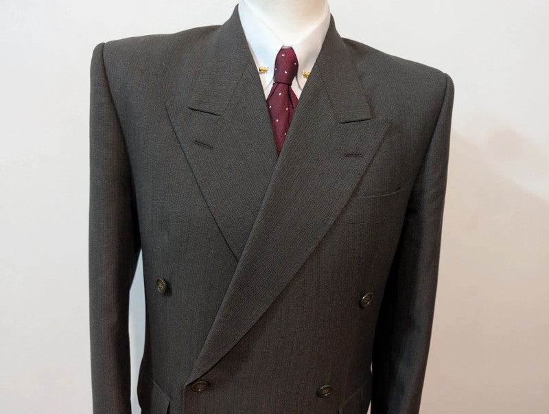 Extraordinaire costume croisé gris en laine.