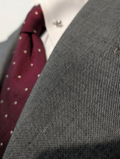 Sympathique costume gris bespoke