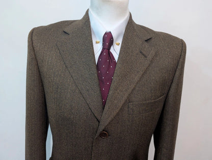 Formidable veste marron à chevron en tweed