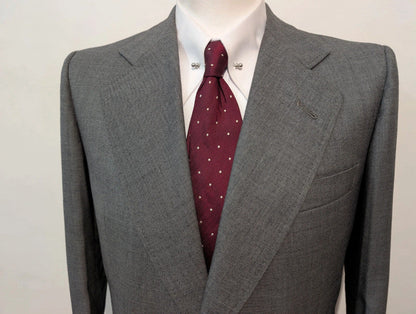 Sympathique costume gris bespoke