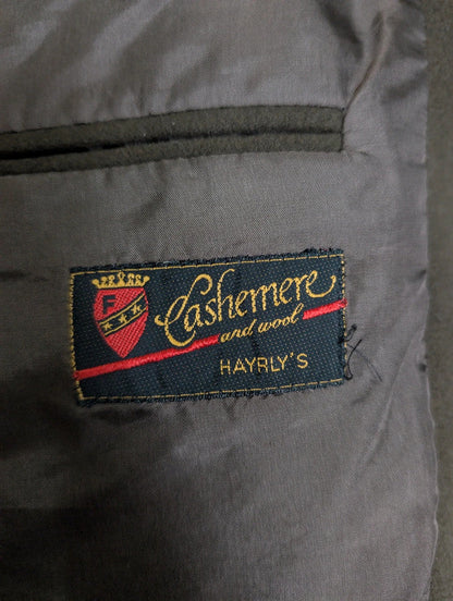 Impressionnante veste verte en laine