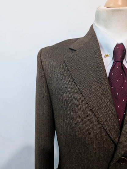 Formidable veste marron à chevron en tweed