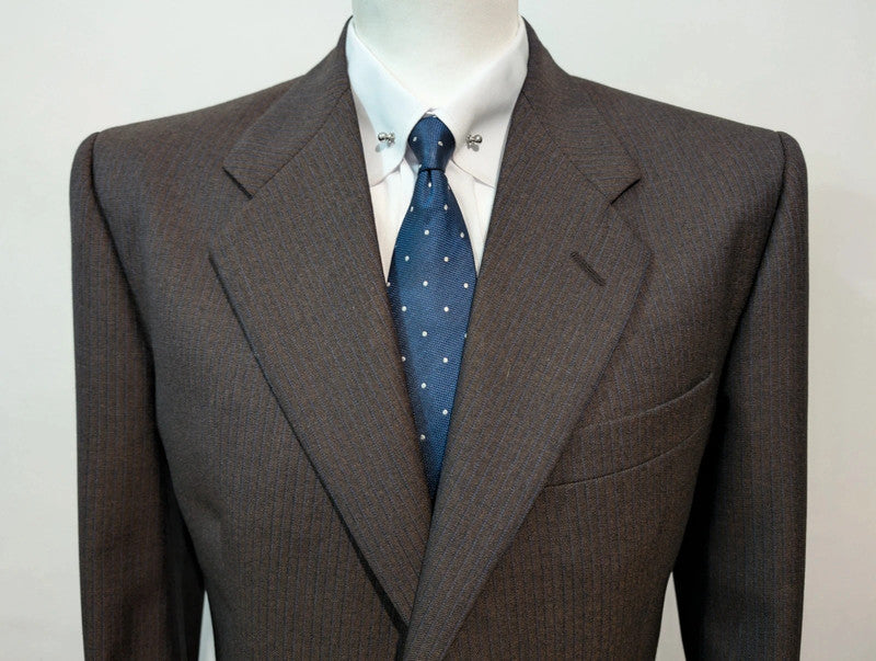 Brown pinstripe vitelline barberis canonico